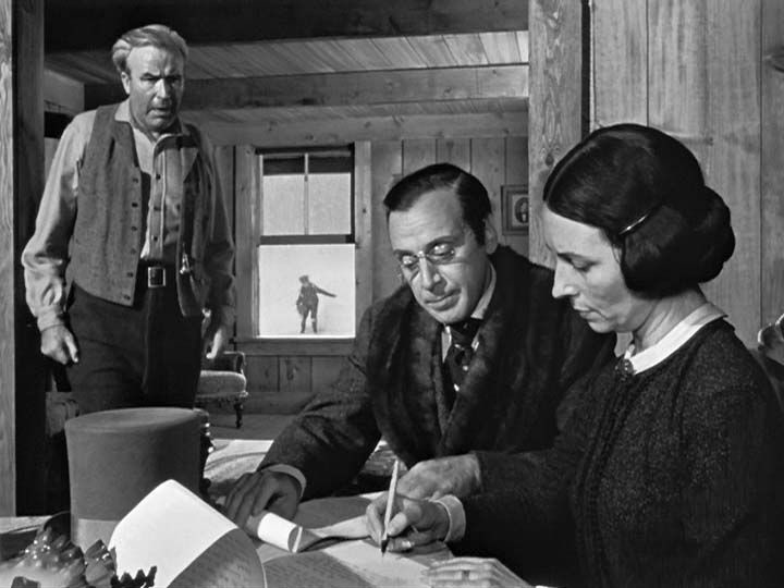 Deep focus: Kane’s mother sending her child off into the world, ending his childhood, which is being portrayed in the background as vivid as the foreground.