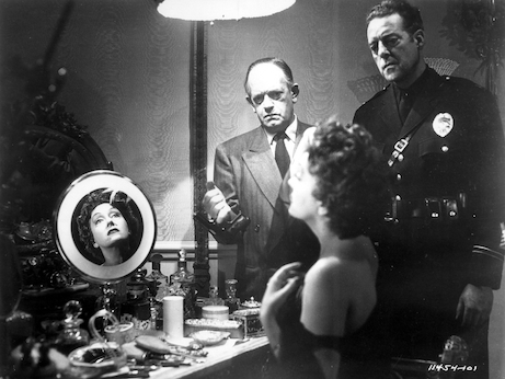 Mirrors are present throughout the film to accentuate the face, a relic of the silent-movie era.